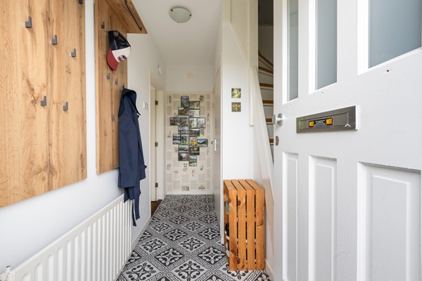 Foto - Te koop: Sfeervolle tussenwoning met groene oase!